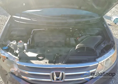 2012 Honda Odyssey Touring z USA, uszkodzony, nr VIN 5FNRL5H95CB014657